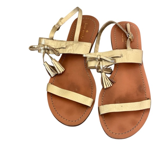 kate spade Shoes - Kate Spade Gold Leather Flat Sandals with Tassel Bow Detail